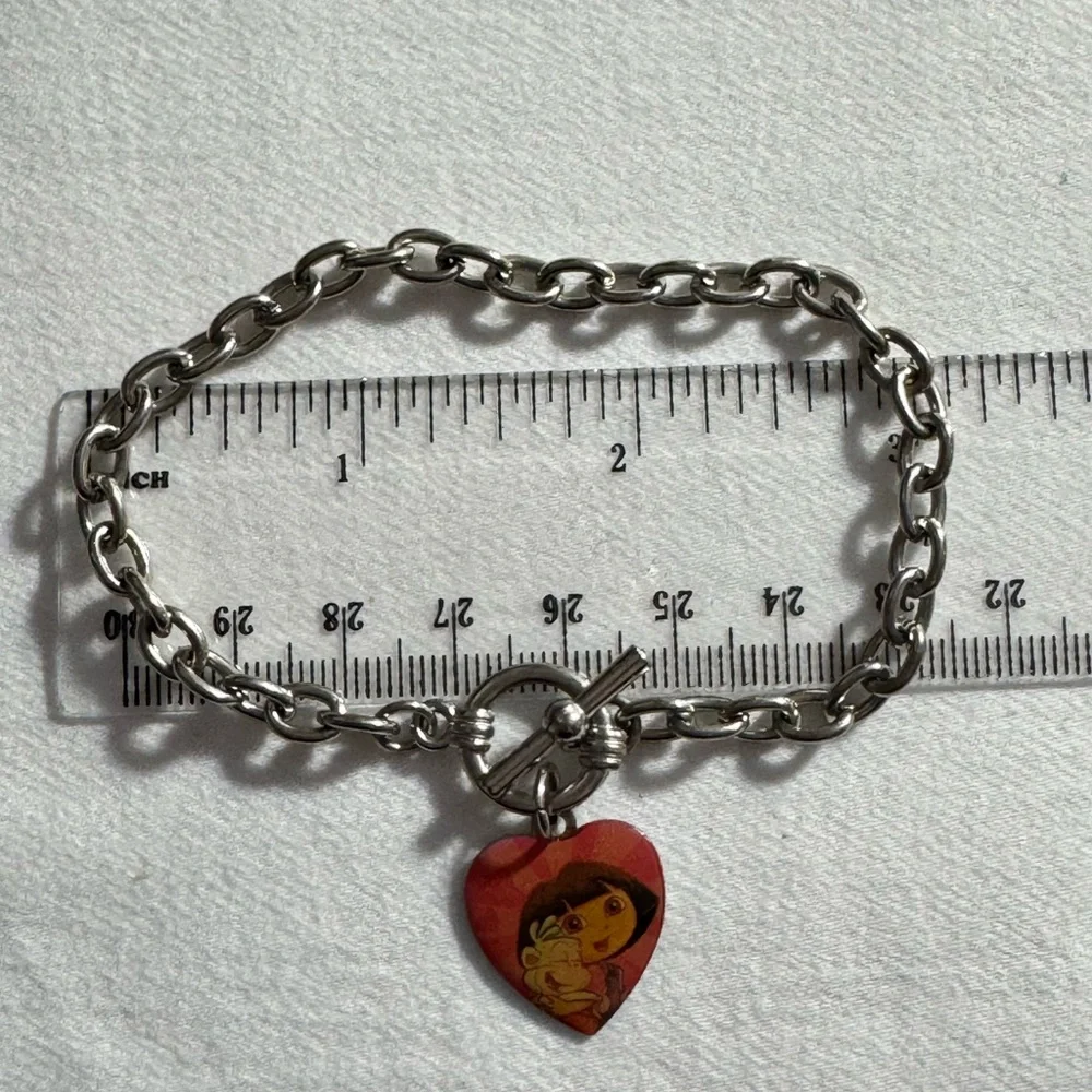 Dora the Explorer charm Bracelet 3 inches diameter 8 inches long